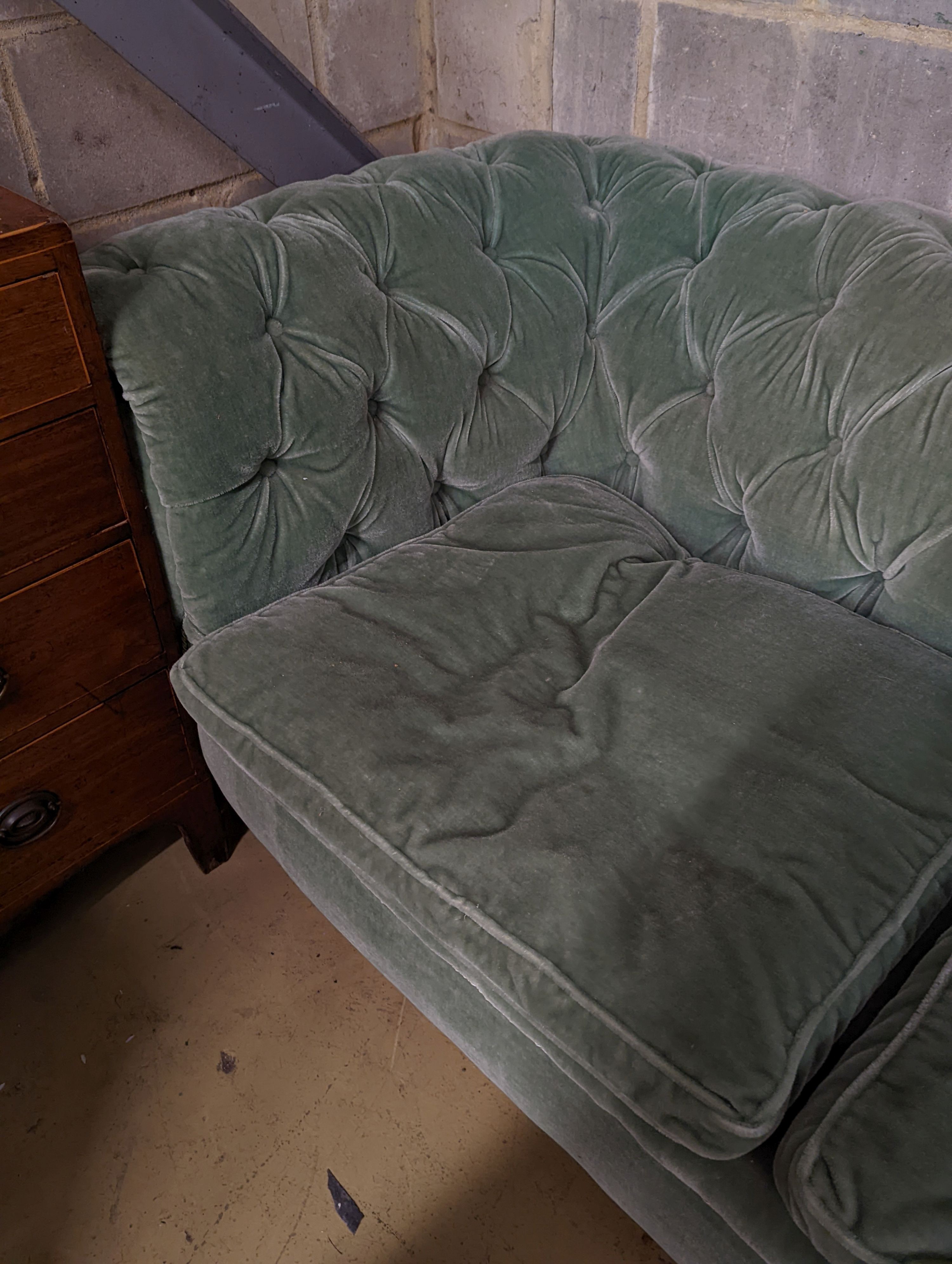A late Victorian Chesterfield settee upholstered in buttoned green fabric, length 194cm, depth 80cm, height 76cm